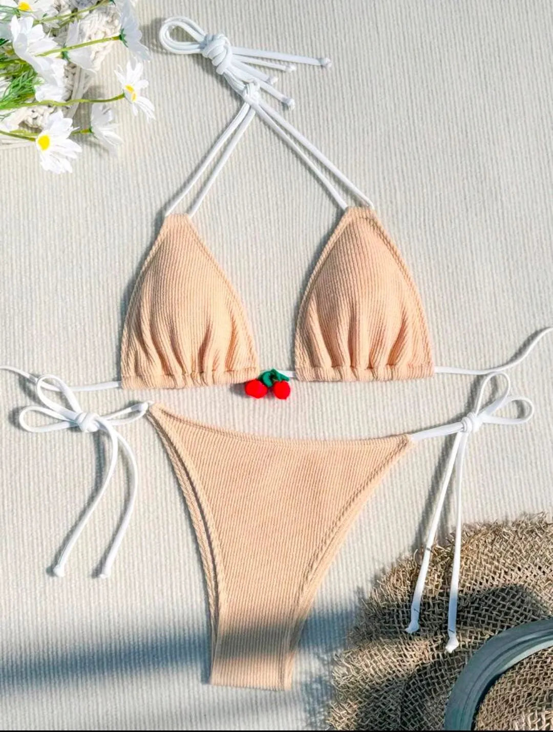 Nylon bikini swimsuit briefs in a solid colour on a mannequin