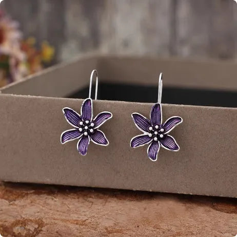 Purple flower-shaped alloy earrings with electroplated finish and butterfly back fastenings