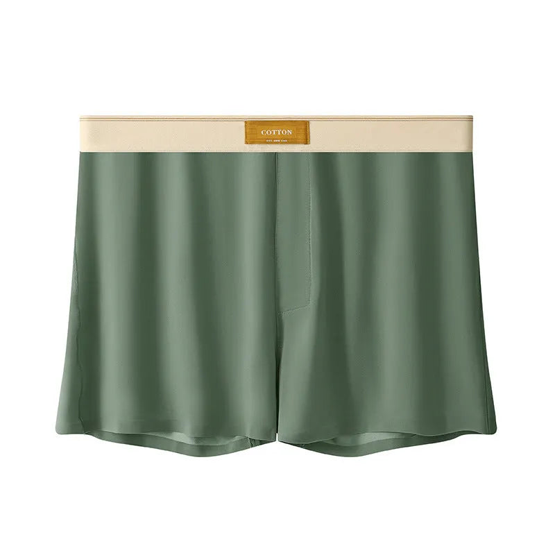 Pack of three men's solid colour loose fit ice silk boxer shorts on a white background