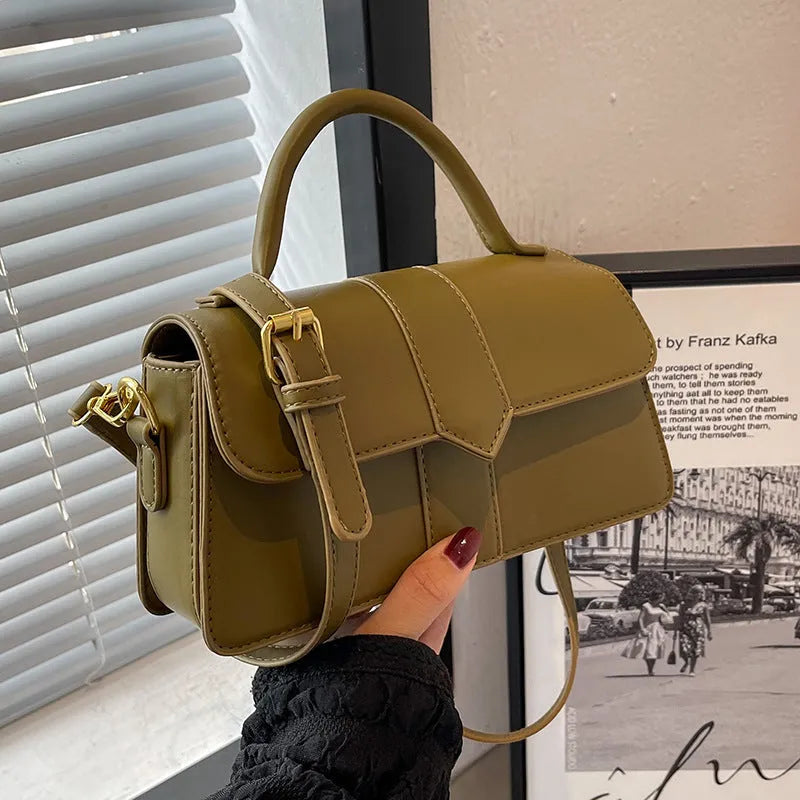 Women's PU leather messenger bag in horizontal square shape with sandwich pocket and file organisation