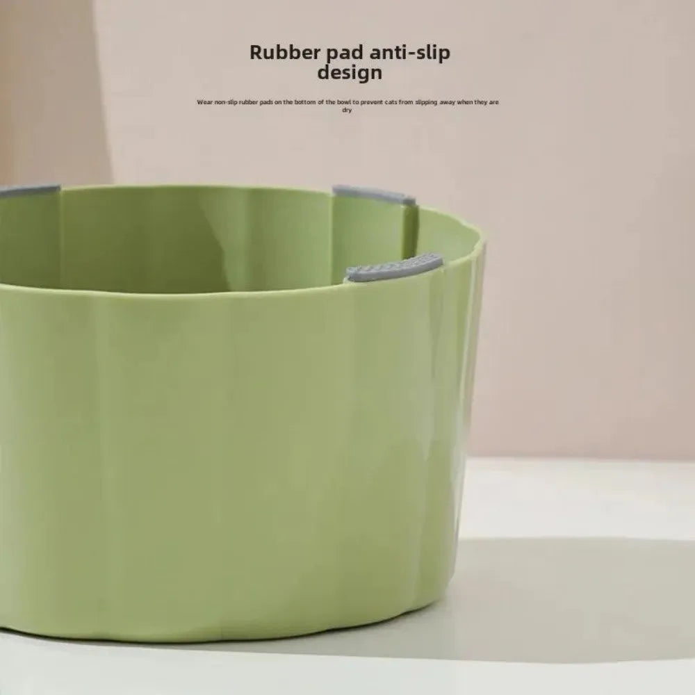 Green high-stand cat bowl with cactus design and anti-slip base.