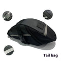 Black cycling tail bag mounted on mountain bike saddle with quick release fixture