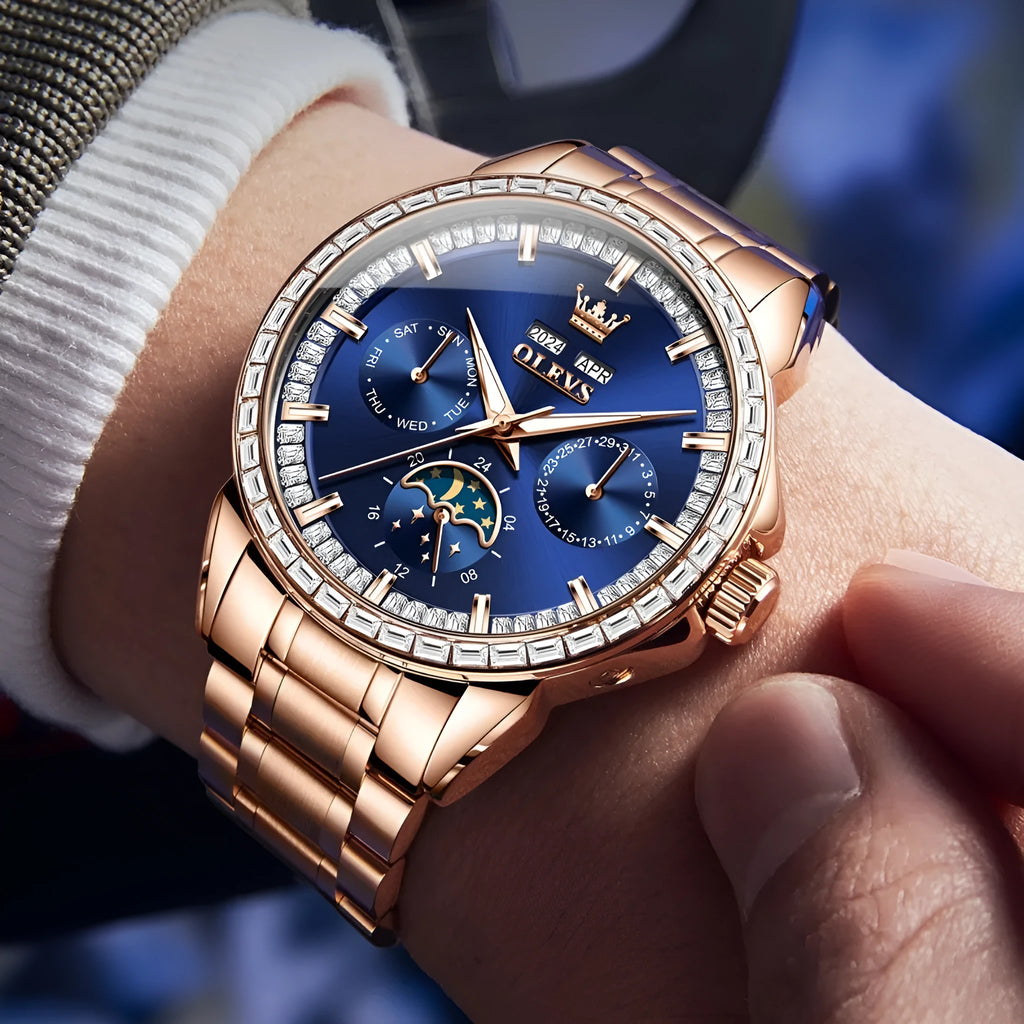 Men's automatic mechanical watch with diamond bezel and stainless steel strap on wrist.