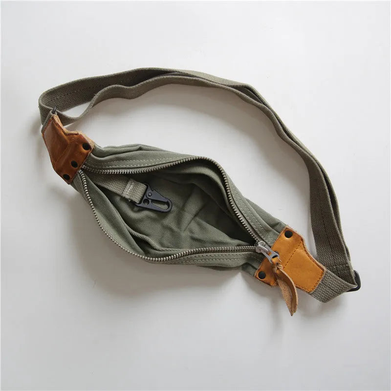 Green military style chest bag made from washed canvas with Italian cowhide leather trim