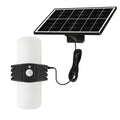 Black outdoor solar floodlight with abstract design and mounting bracket for wall installation