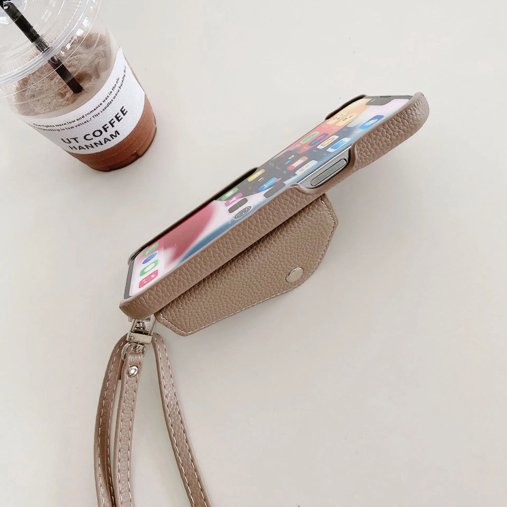 White PC leather card holder crossbody phone case with lychee pattern, triangle veil card slot, and lanyard for iPhone