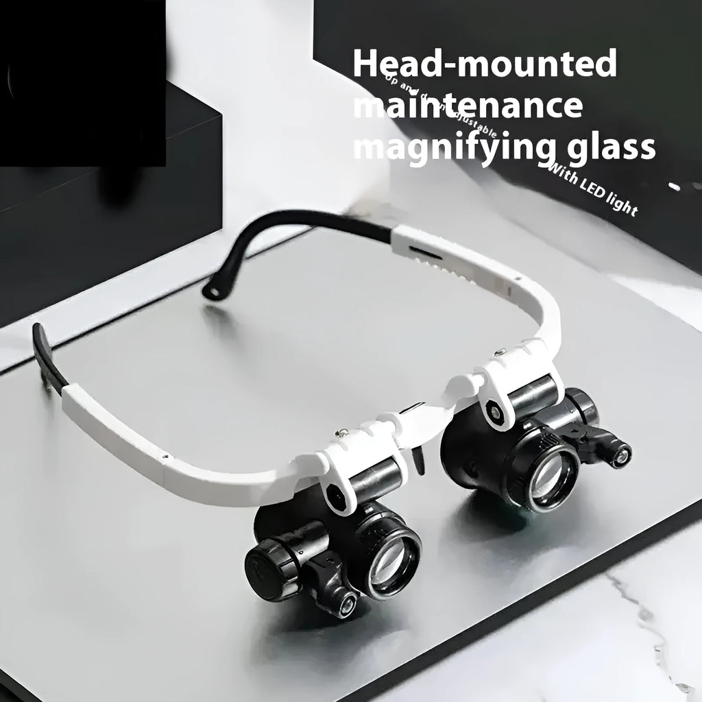 White foldable head-mounted magnifying glass with LED light for 30X precision repair work.