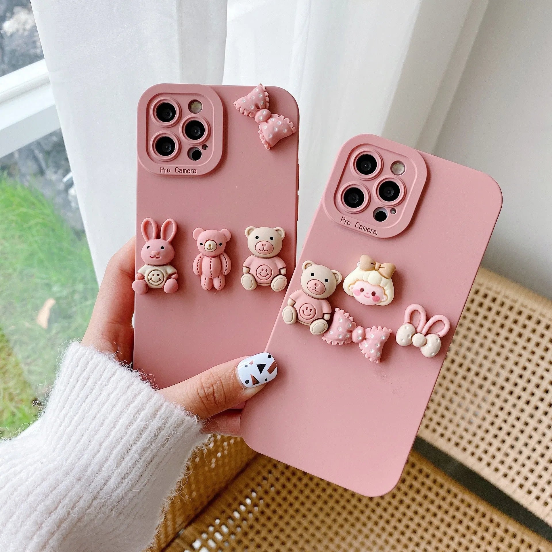 Women's decorative iPhone case with a raised three-dimensional doll bear design on a TPU protective cover.