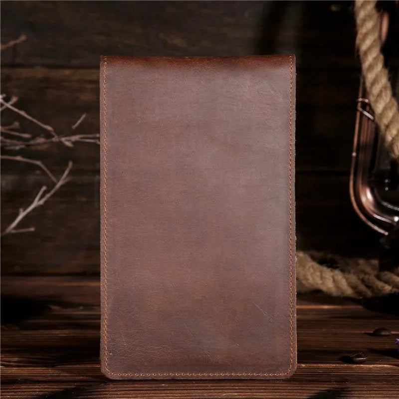 Men's long leather wallet open showing 18 card slots, cash compartment, and phone pocket.