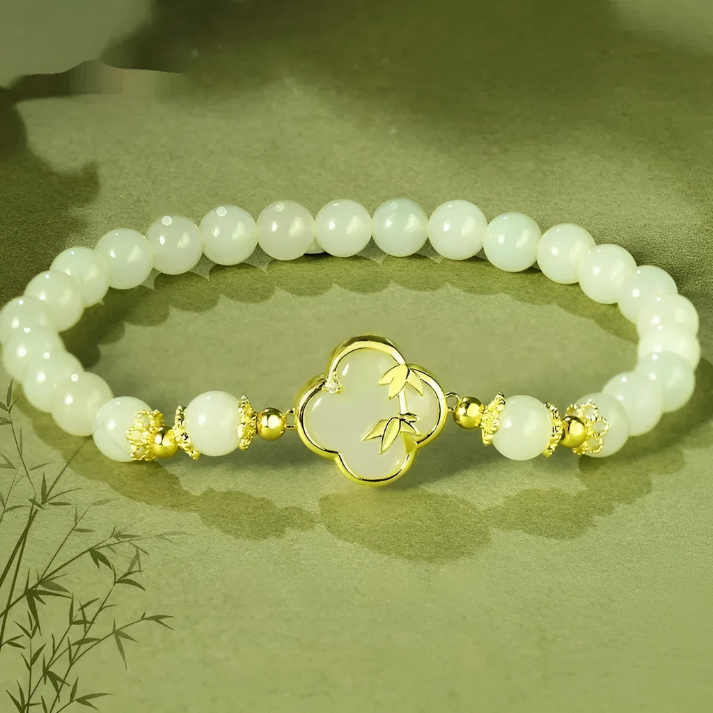 Hetian jade bracelet and necklace set with silver leaf inlay in national style design
