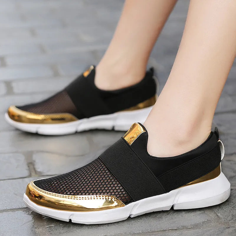 Blue, black, and grey low-cut women's casual sneakers with breathable mesh lining.