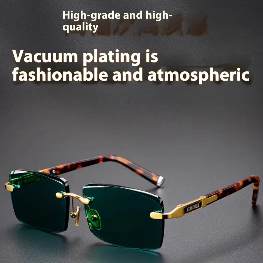 Frameless sunglasses with dark green crystal lenses showing a decorative wealth attracting pattern.