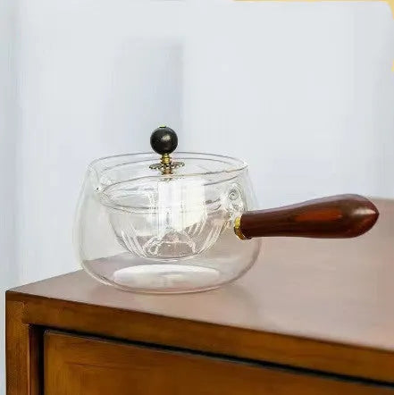 Semi-automatic rotary glass teapot with wooden handle and infuser, in grey and transparent colour options.