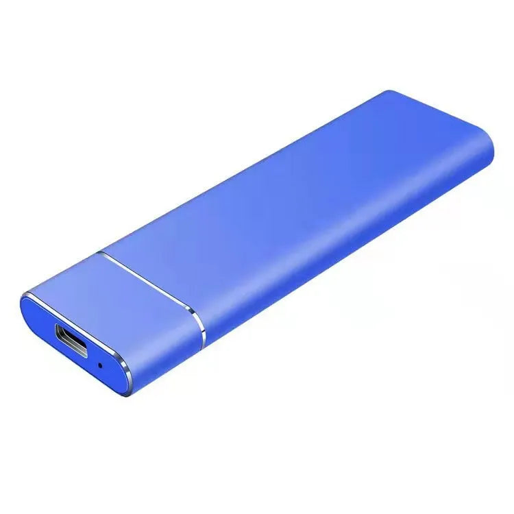Ultra-thin silver metal external hard drive with data cable on a desk.