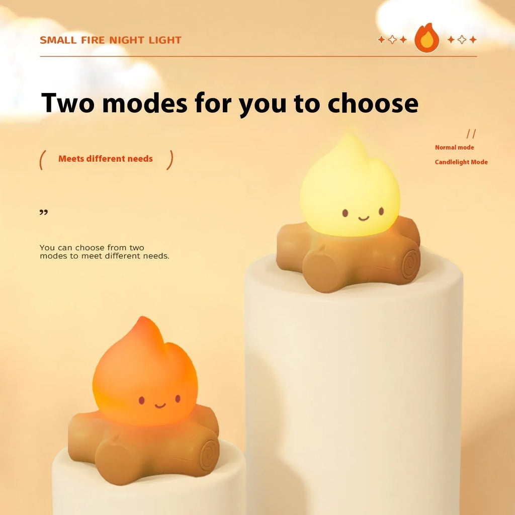 Silicone cartoon fire pile shaped night lamp with yellow glow, shown next to a USB charging cable.