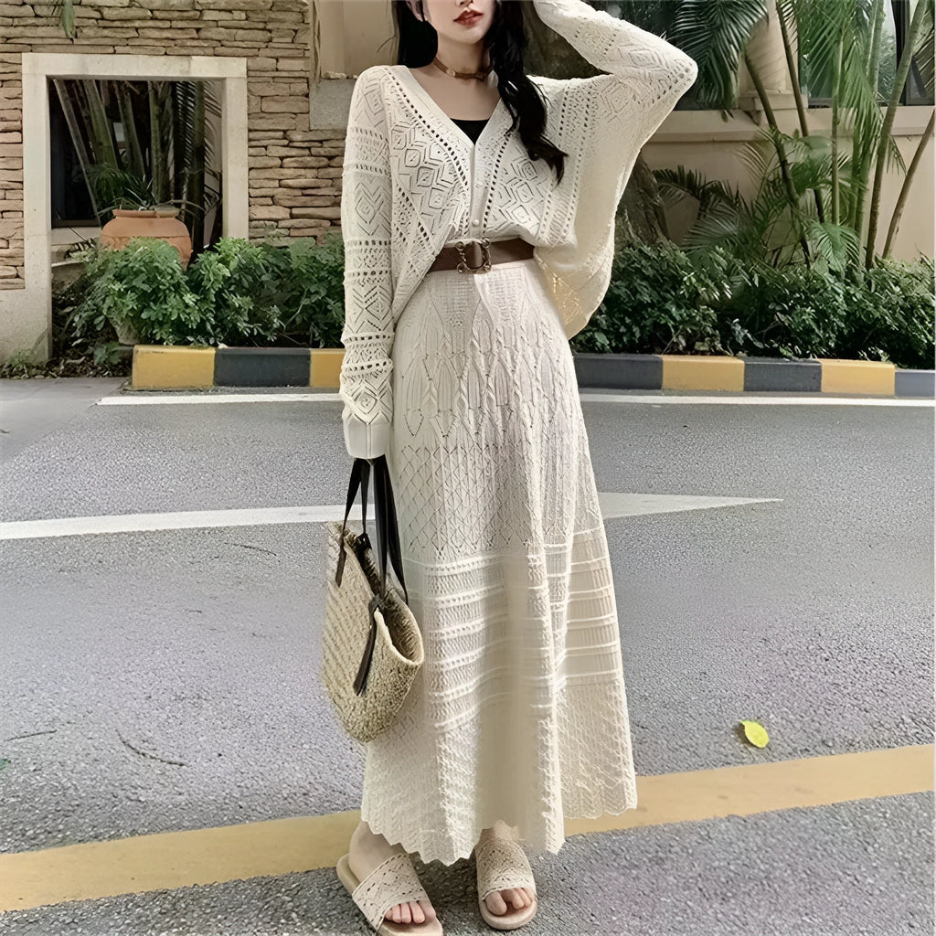 Beige two-piece set with hollowed-out knit top and mid-length lace-up skirt and belt