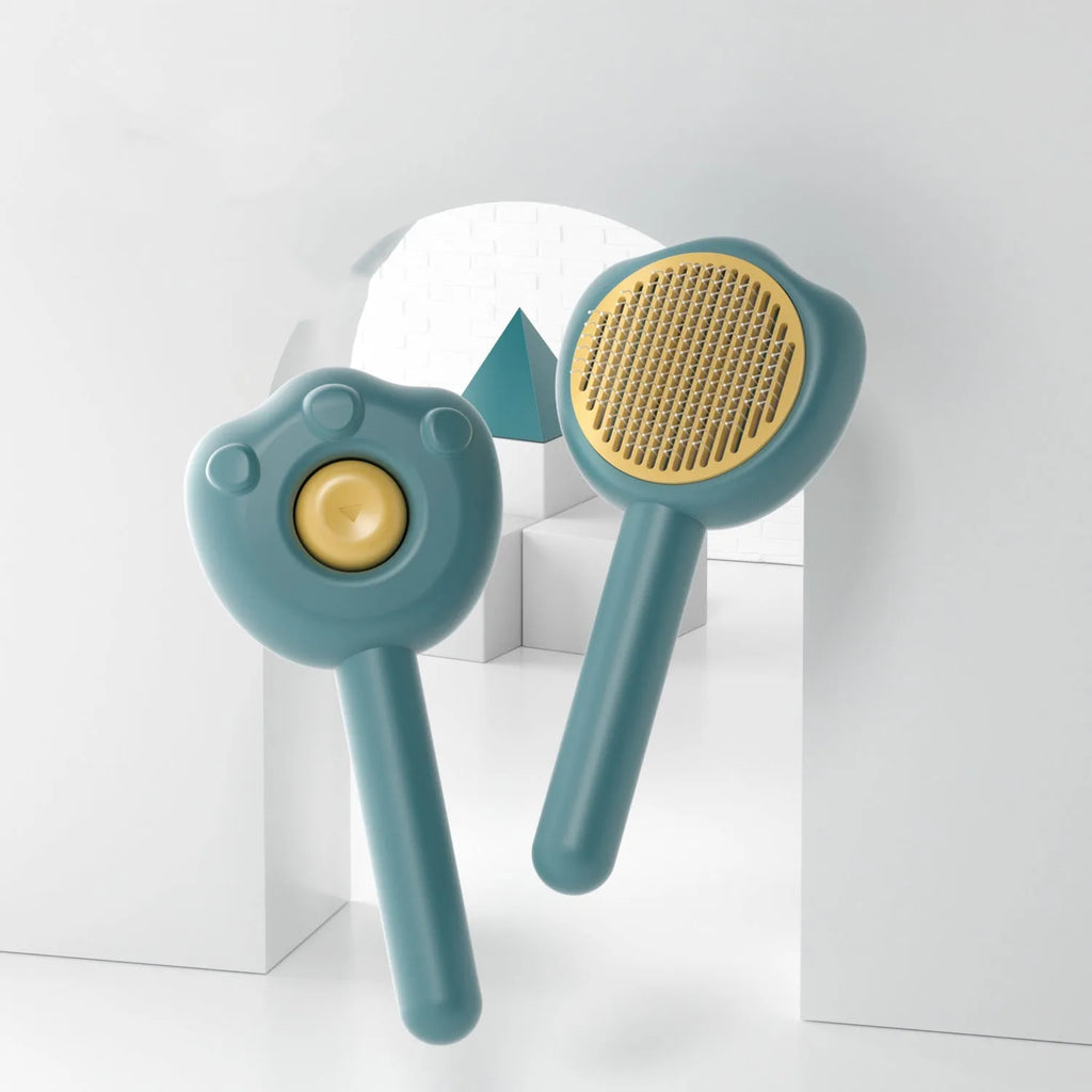 Blue self-cleaning pet grooming comb with needle pins for cats and small dogs, showing its 183mm size.