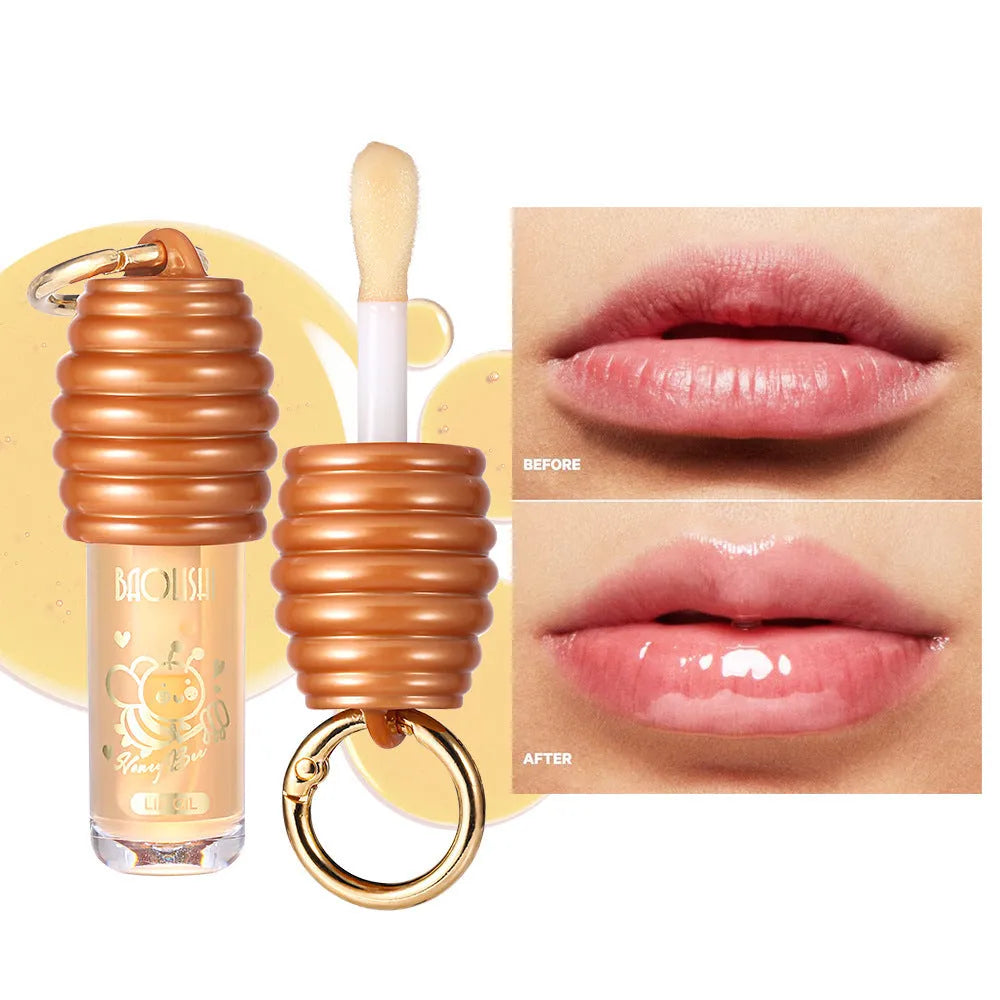 Honey lip gloss with keychain attachment in portable packaging