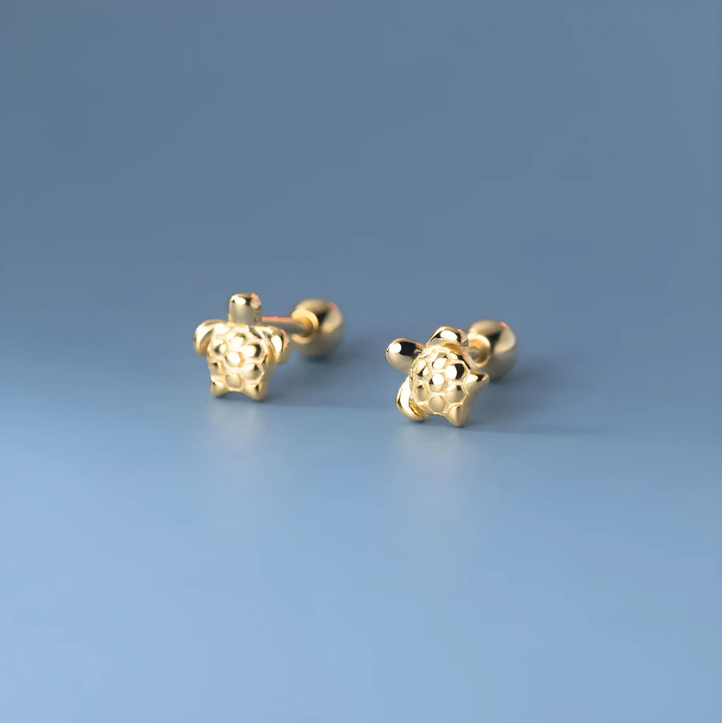 Small 925 sterling silver turtle stud earrings with thread line detail, shown in gold and silver colour options