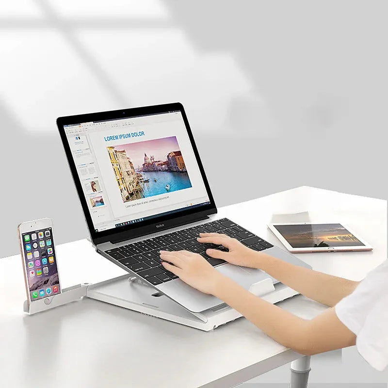 New folding laptop stand in black with 9-level angle adjustment, cooling slot, and phone holder for 10-15.6 inch laptops