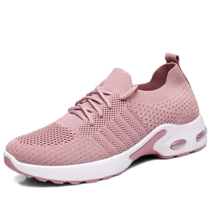 Women's black mesh lace-up sneakers with a round toe and soft sole on a white background.