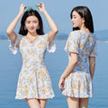 Women's floral print high waist one-piece swimsuit in white and blue colour