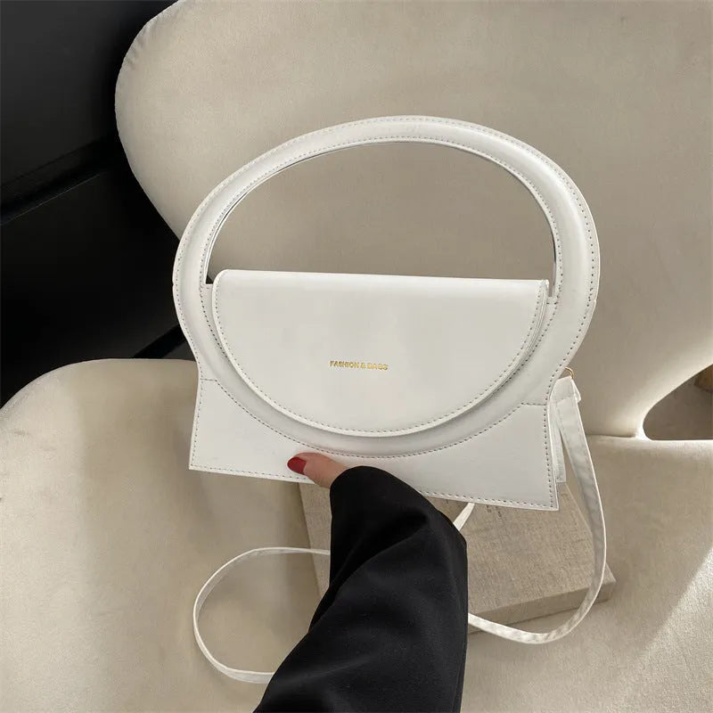 Horizontal square PU leather messenger bag with shoulder strap and stitching detail
