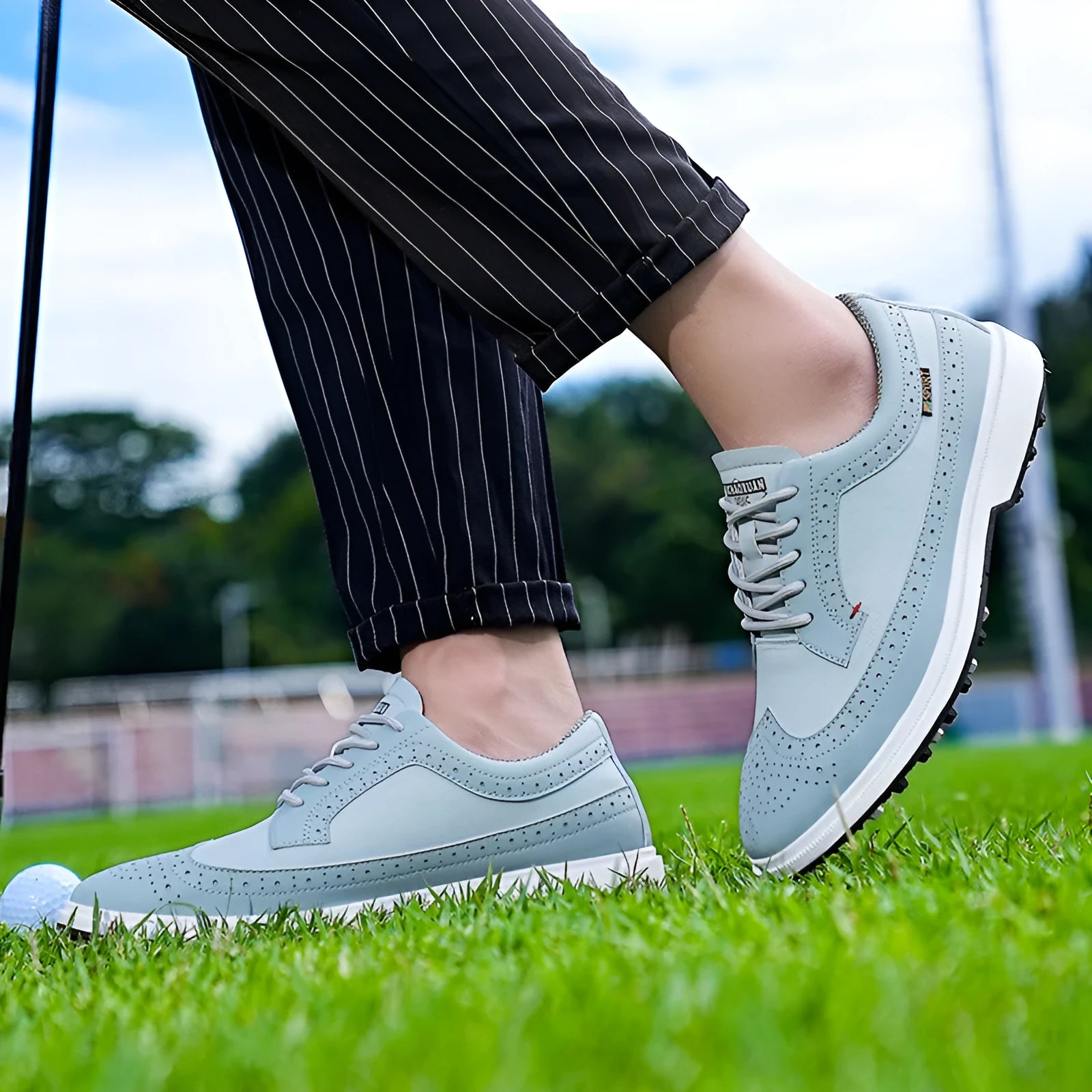 Men's golf shoe in Lake Blue with genuine leather upper and rubber outsole