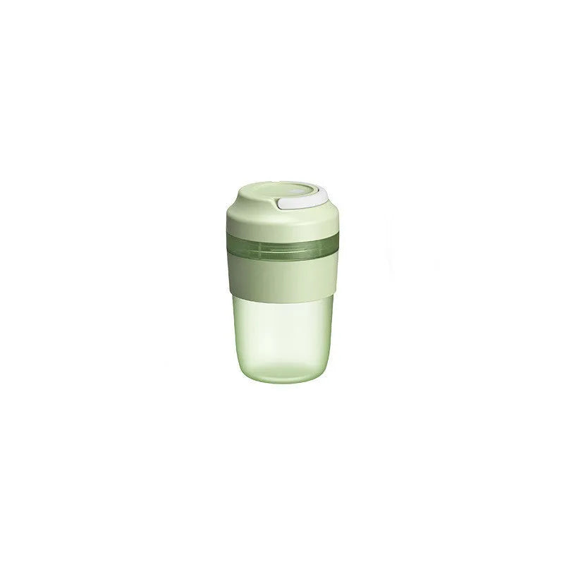 Grape purple portable USB blender cup with lid, showing stainless steel blades inside 400ml capacity bottle.