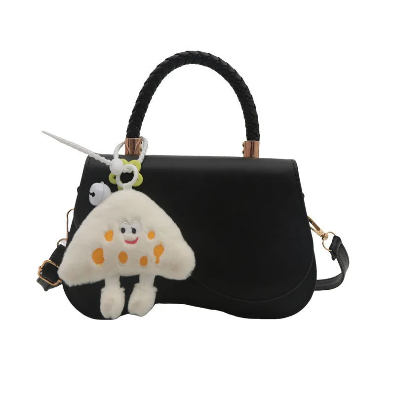 Soft PU one-shoulder bag with magnetic snap, horizontal square shape, shown in khaki with optional pendant.