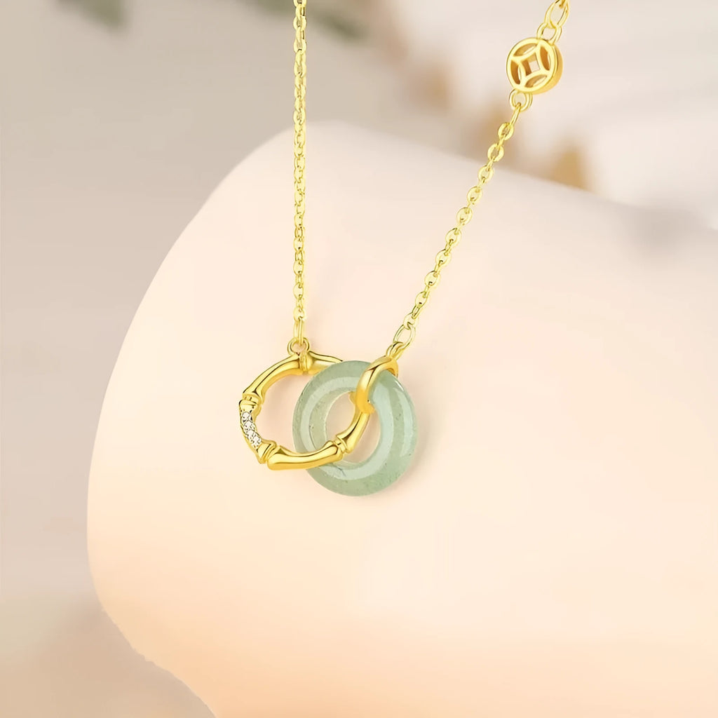 Sterling silver bamboo joint peace buckle necklace with O-ring chain and pearl detail