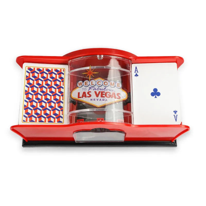 Manual card shuffler with hand crank mechanism on table with playing cards