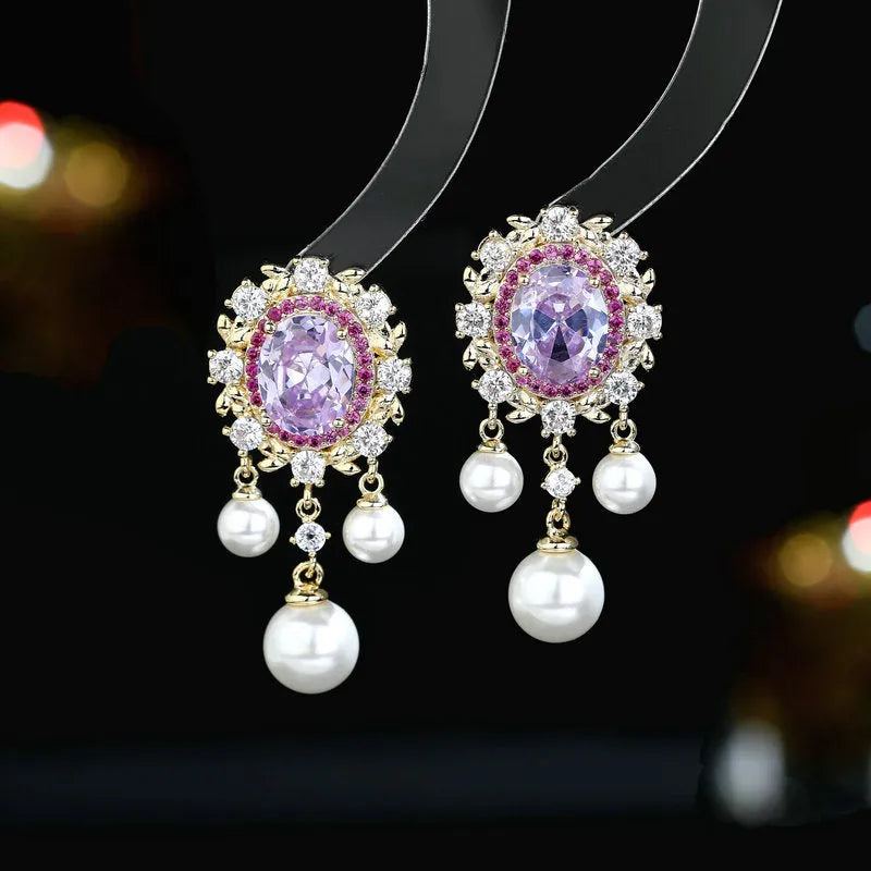 Oval geometric tassel earrings with zircon inlaid pearls in light purple, pink, or white.