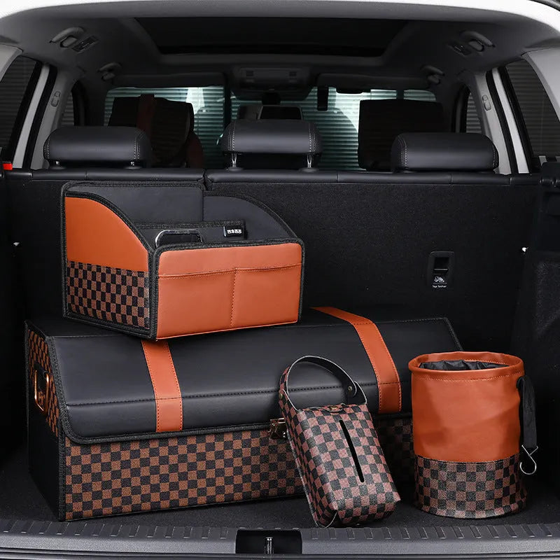 Brown leather folding interior trash can with a retractable handle, shown unfolded.