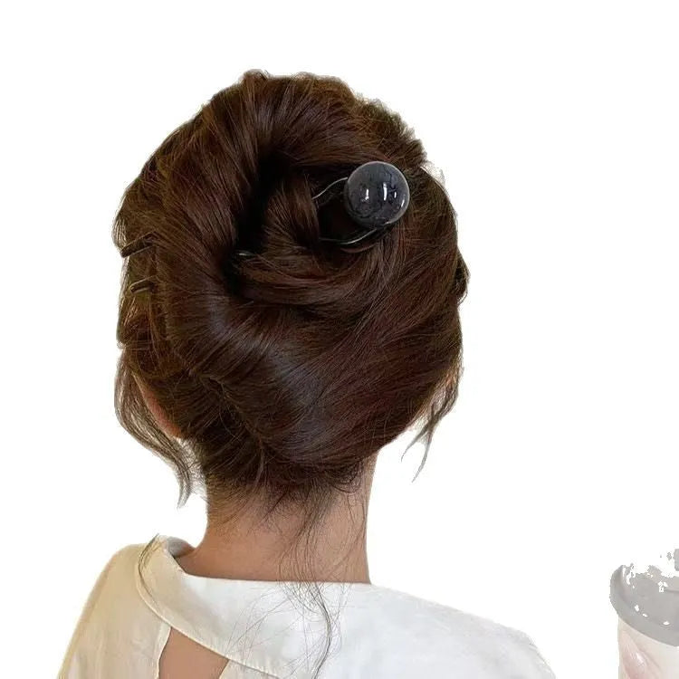 Acrylic U-shaped hair barrettes with ball decoration in beige, caramel, dark grey, and green colours
