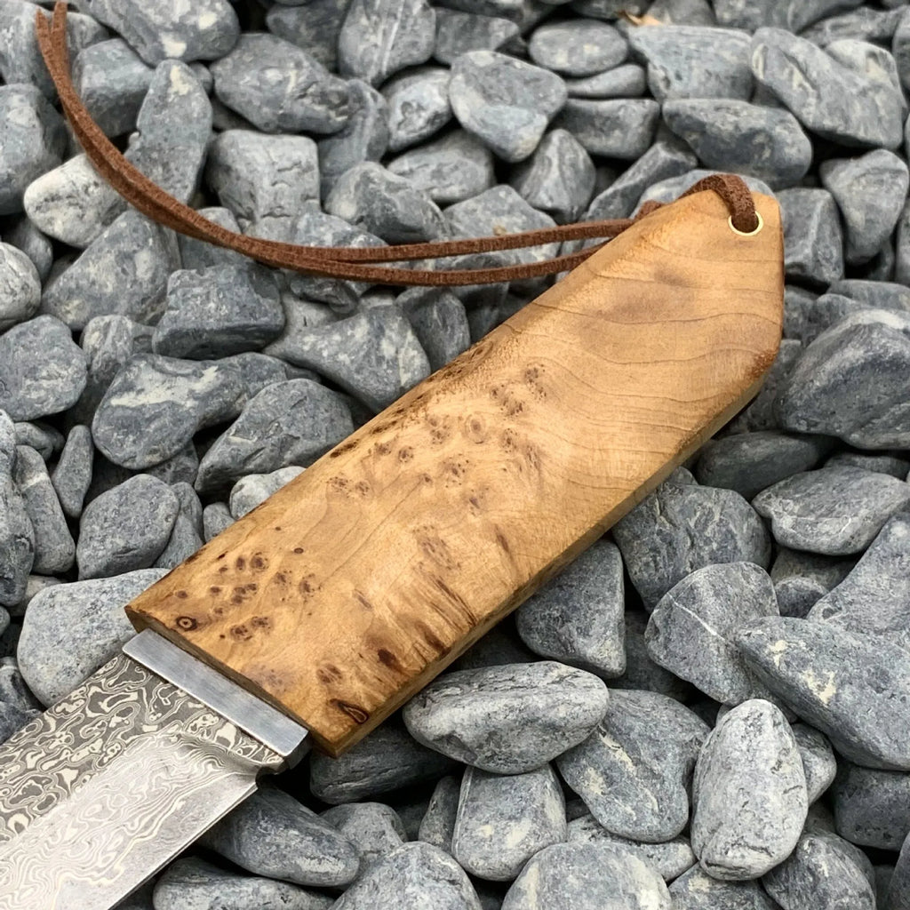 White Shadow Damascus pattern camping knife with Thuja wood handle, showing full 18cm length.