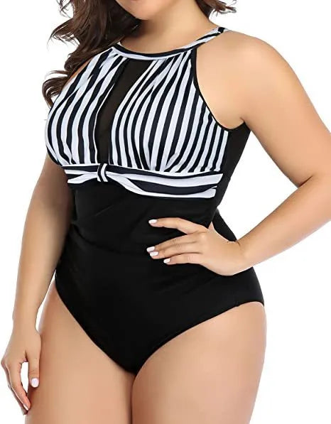 Women's black lace one-piece swimsuit on a mannequin, showing front design.