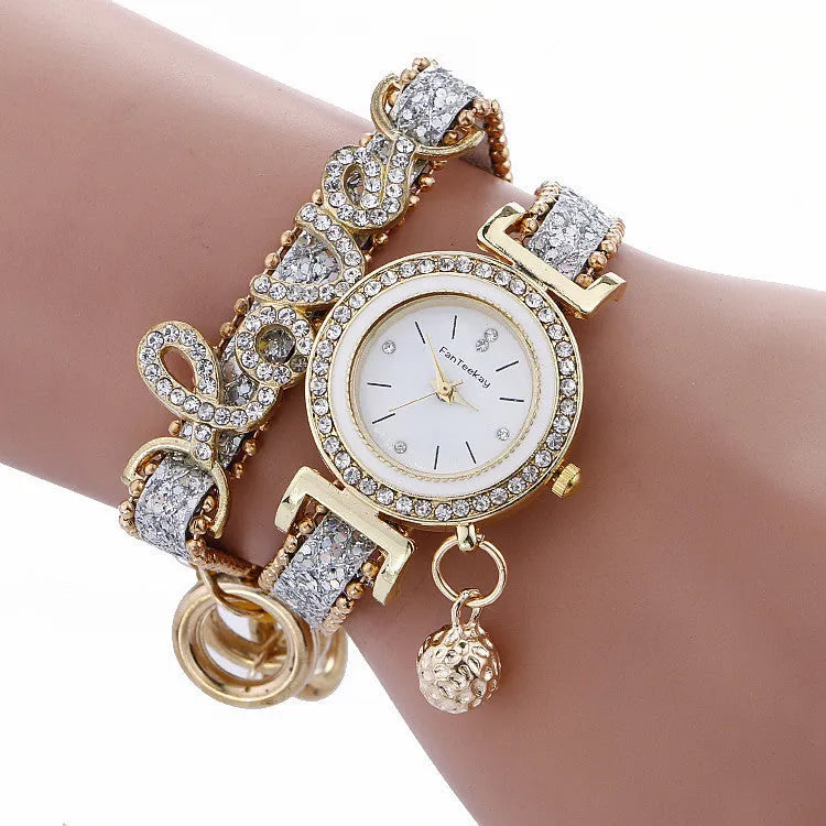 Sequin bracelet watch with round 25mm dial, alloy case and faux leather strap in black