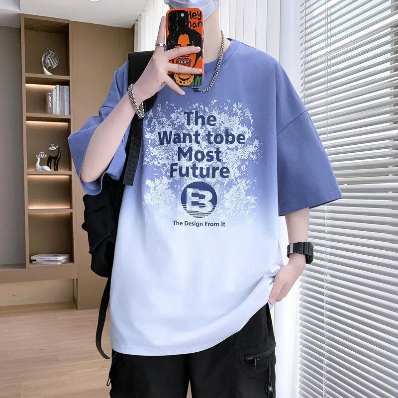 Boys printed cotton blend t-shirt with short sleeves and drop-shoulder design in various colours.