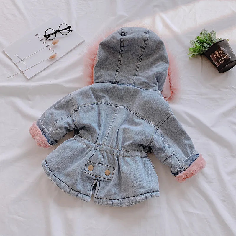 Blue denim coat for a girl with a non-removable hood and pink lining visible.