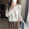Women's beige acrylic fibre long-sleeved cardigan coat with a regular fit.