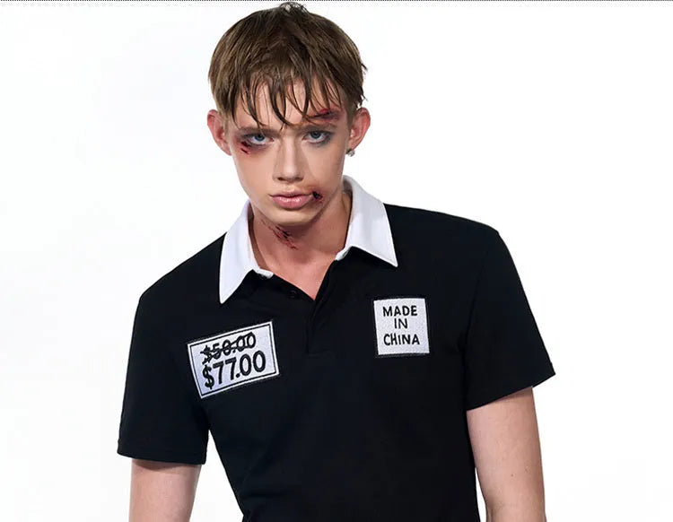 Black men's slim fit summer polo shirt with embroidery detail and short sleeves