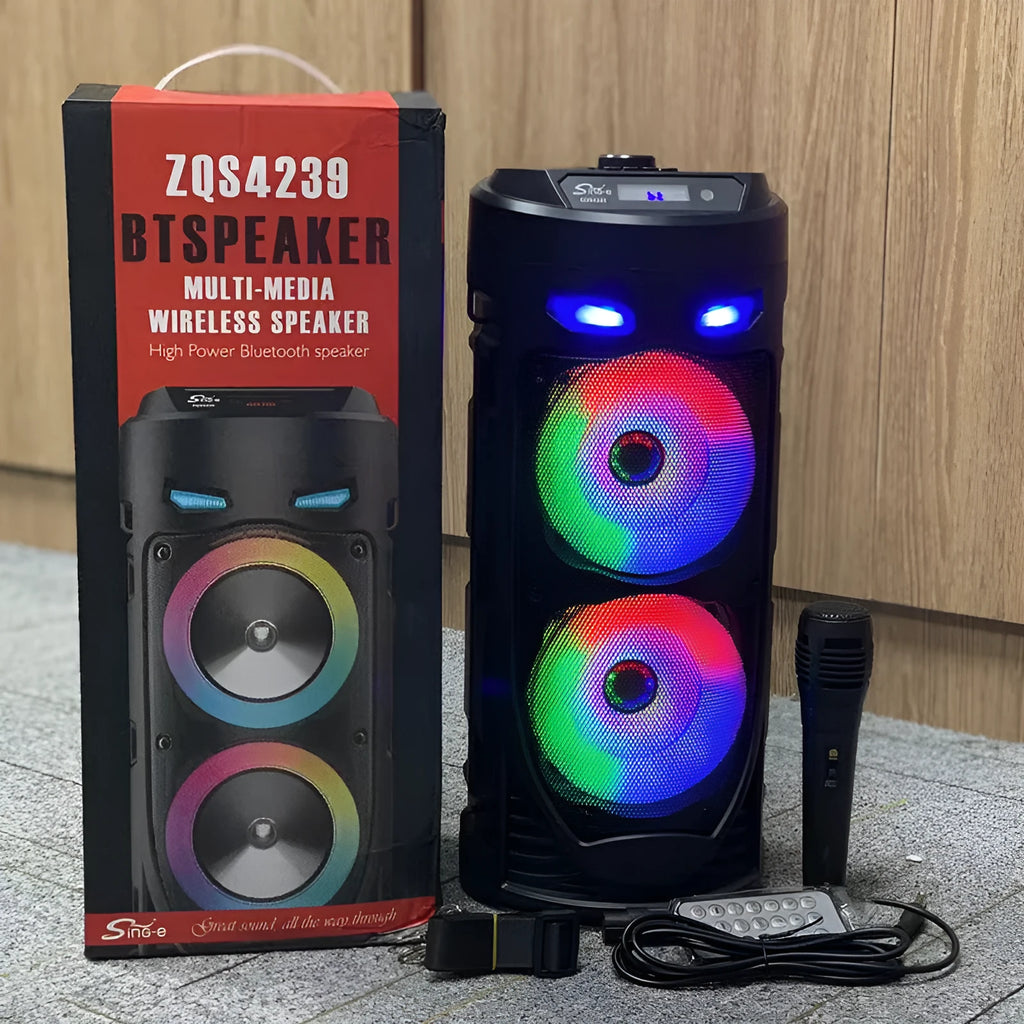 Black portable Bluetooth speaker with colourful dual horns, showing front panel with controls.