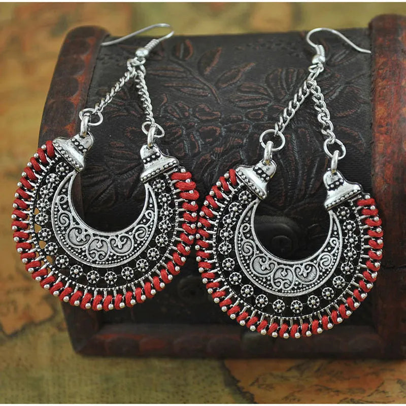 Bohemian vintage alloy and rope U-shaped drop earrings with hollow carved meniscus flower basket design, 5.8cm length, 3.8cm width