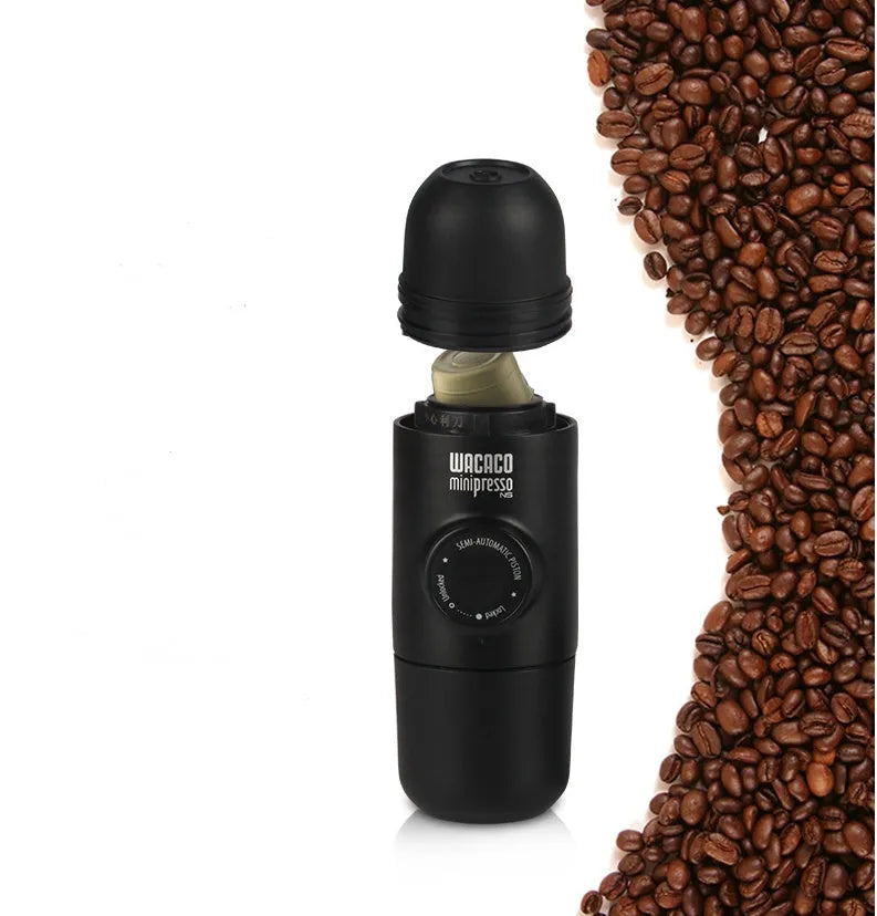 Black portable manual coffee machine showing compact 6x17.5cm design with stainless steel components