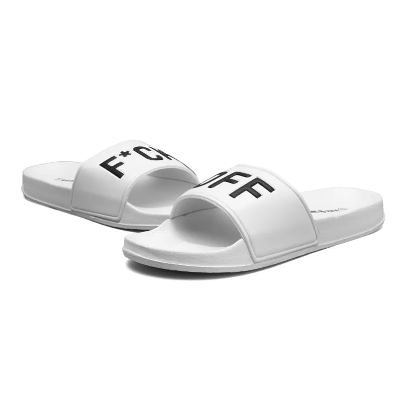 Large black and white open-toe men's slippers with a rubber sole, showing size range 36 to 46.