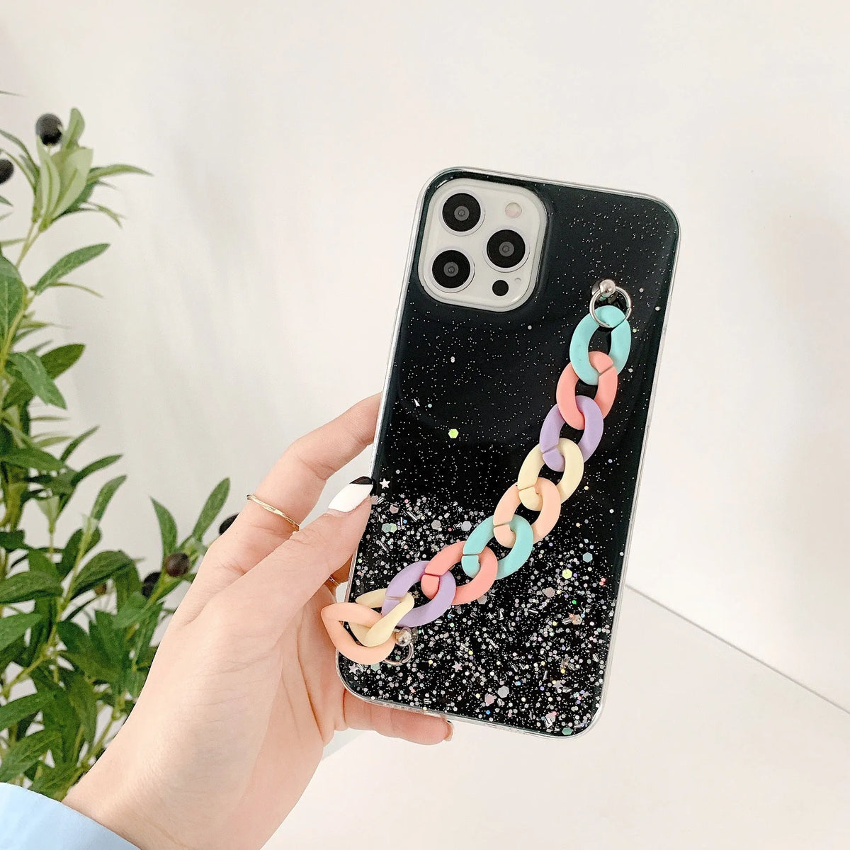 Epoxy resin phone case with bracelet starry design for iPhone 15