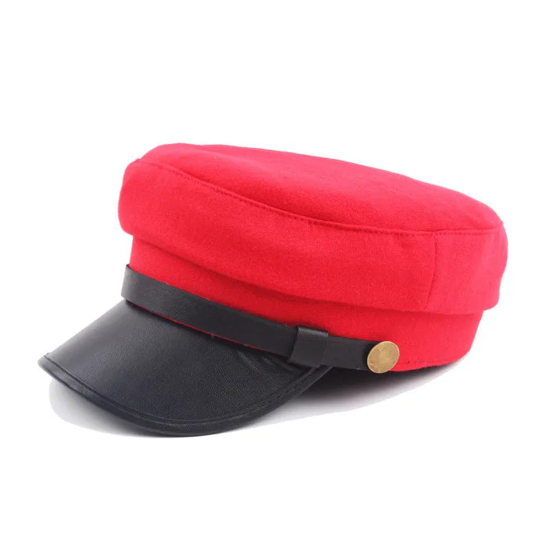 Navy imitation leather flat brim peaked cap with dome crown on white background