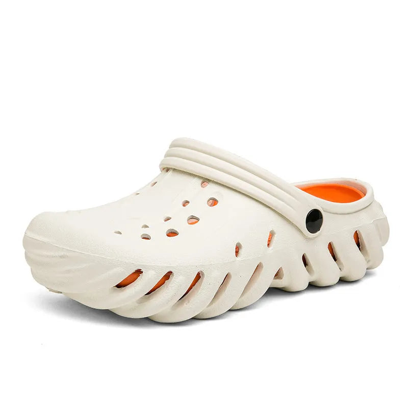 Men's beige EVA slipper sandals with a perforated hollow-out design and a round toe.