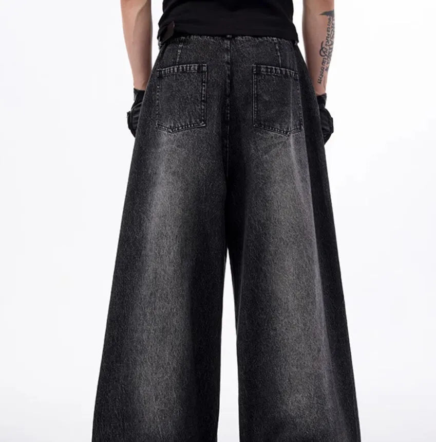 Black and grey Korean-style wide leg denim trousers with matching vest top laid flat.